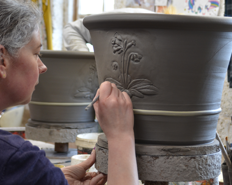 Caroline decorating a cowslip