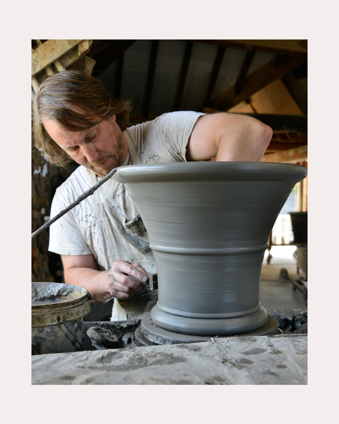 Simon throwing a lemon pot